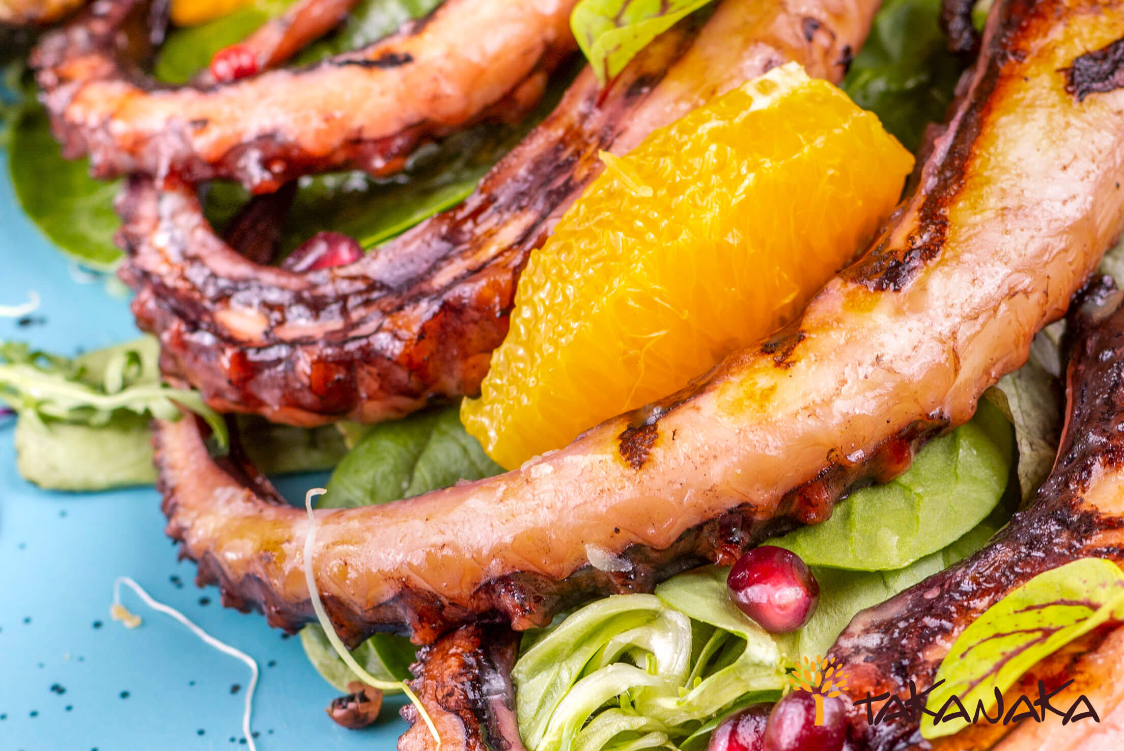 Grilled calamari tentacles with baked potatoes and citrus salad mix - Image 3