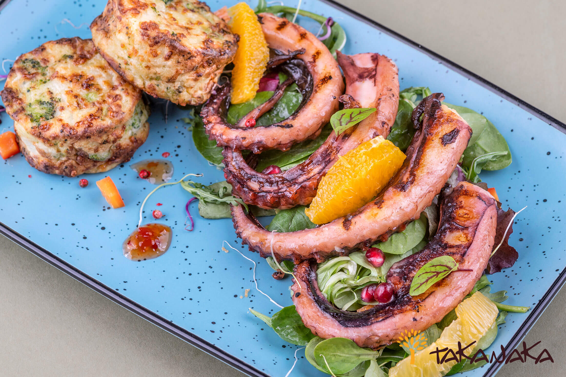 Grilled calamari tentacles with baked potatoes and citrus salad mix - Image 2